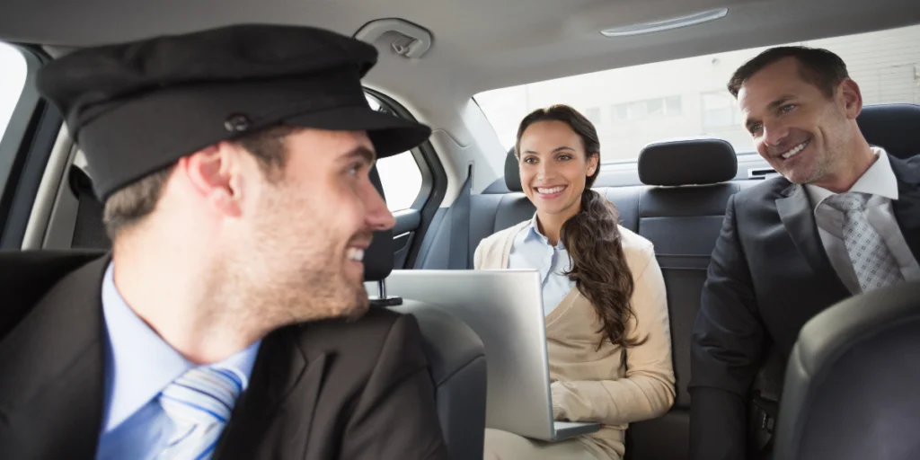 People sitting in a taxi