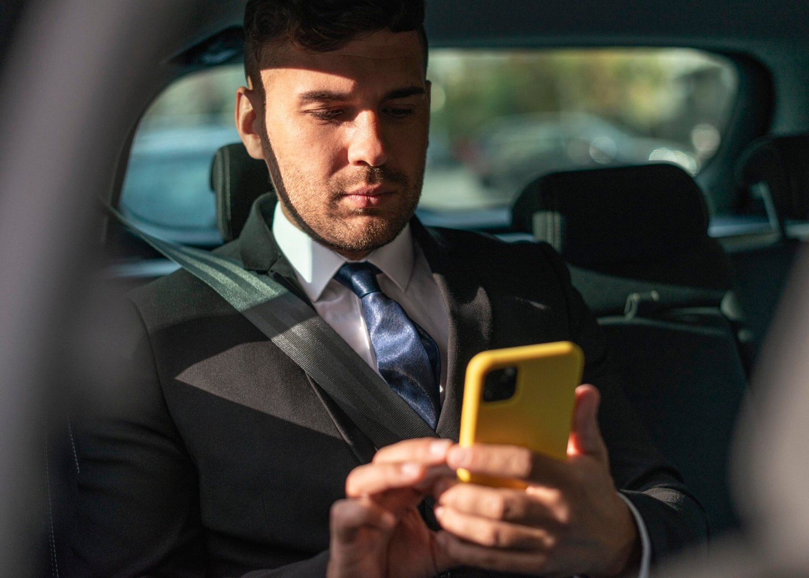 business man car being passenger
